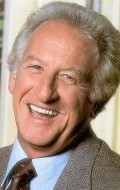 Full Bob Uecker filmography who acted in the TV series D.C. Follies  (serial 1987-1989).