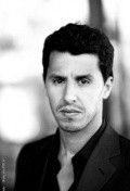 Full Mounir Margoum filmography who acted in the TV series House of Saddam.